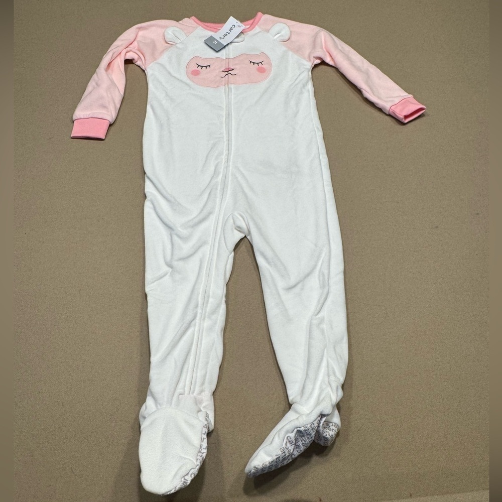 Carter's white and pink footed sleeper features a cute lamb design